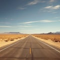 empty highway stretches ahead with parallel lines disappearing into the great landscape.