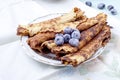 Empty homemade waffle cones with blueberries