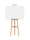 Empty horizontal canvas on wooden easel, isolated on white background. Free, copy space for your picture. Artwork