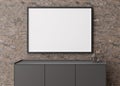 Empty horizontal picture frame on brown stone wall in modern living room. Mock up interior in contemporary style. Free Royalty Free Stock Photo