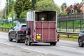 Empty horse carrier trailer box on uk motorway in fast motion