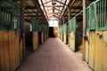 Empty horse stall in an animal farm rural scene Royalty Free Stock Photo