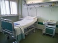 Empty Hospital Clinic Room with Bed, Drawer unit and Window Royalty Free Stock Photo