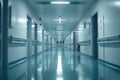 Empty Hospital Corridor With Fluorescent Lighting and Reflection on Floor
