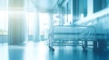 Empty hospital corridor. Modern hospital with a spacious room and a hospital bed. Blurred interior of hospital. Royalty Free Stock Photo