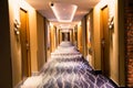 Empty hotel corridor view at night with lights Royalty Free Stock Photo