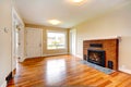 Empty house interior. Living room in soft ivory with fireplace