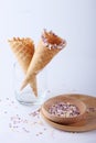 Empty ice cream cones with colorfule sprikles Royalty Free Stock Photo
