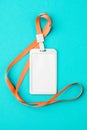 Empty ID card / icon with an orange belt, on a blue background. Space for text Royalty Free Stock Photo