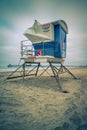 Empty Imperial Beach Pier and lifeguard tower, vertical image