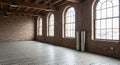 Empty Industrial Loft Space with Exposed Brick Walls and Large Windows interior Royalty Free Stock Photo