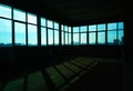 Empty industrial room with multiple windows background Royalty Free Stock Photo