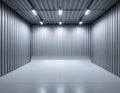 Empty Industrial Storage Unit with Ribbed Walls and Fluorescent Lighting Overhead Royalty Free Stock Photo
