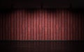 empty industrial style studio red wood tile plank wall and dark concrete floor with reflections and spot lights 3d Royalty Free Stock Photo