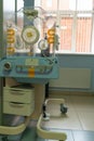 Infant incubator in an hospital room. Closeup view of nursery incubator for newborn. Box for carrying premature babies