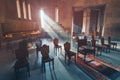 Empty interior of a dark and ancient Armenian church into which a bright beam of light penetrates. The concept of religion and Royalty Free Stock Photo