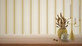 Empty interior design concept, wooden table, desk or shelf close up in yellow tones. Ceramic and glass vases with dry plants, Royalty Free Stock Photo