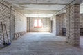 Empty interior in house without repair with white silicate brick walls Royalty Free Stock Photo