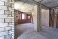 Empty interior in house without repair with white silicate brick walls Royalty Free Stock Photo