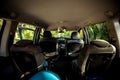 Empty interior of a minivan car with luggage ready to travel. Assembling the car for a road trip. View from the inside Royalty Free Stock Photo