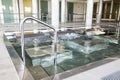 Empty interior swimming pool with relaxation area. Royalty Free Stock Photo