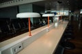 Empty international airport building, lack of passengers. Coronavirus outbreak, green energy power outlet Royalty Free Stock Photo