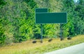 Empty interstate road sign on the left side of the road Royalty Free Stock Photo