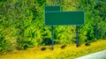 Empty interstate road sign on the left side of the road Royalty Free Stock Photo
