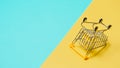 Empty inverted shopping cart, copy space