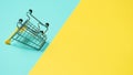 Empty inverted shopping cart, copy space