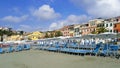 Empty Italian beach with lots of sun loungers Royalty Free Stock Photo