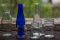 Empty jars and bottles on the wooden window sill