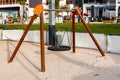 Empty kids swings at JBR beach in Dubai Royalty Free Stock Photo