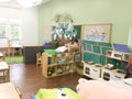 empty kindergarten class room with kids stuffs and toys