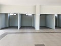 An empty kiosk or retail unit tenant area inside the train station building that is still under construction Royalty Free Stock Photo