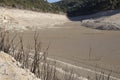 Empty lake at Bimont Dam in France