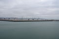 Empty Le Havre Port in France with uplifted gantry cranes without movement due to reduced traffic