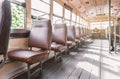 Empty leather seat inside the vintage auto bus of bangkok metropolis