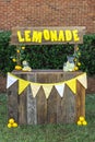 An empty lemonade stand ready for children to start selling lemonade on a hot summer day as their first business