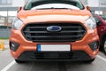 Empty License plate in the front of a orange car Royalty Free Stock Photo