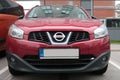 Empty License plate in the front of a red car Royalty Free Stock Photo