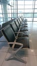 Empty lined up seats at the airport gate Royalty Free Stock Photo