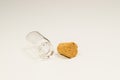 Empty little bottle with cork stopper isolated on white. transparent container. test tube. copy space Royalty Free Stock Photo