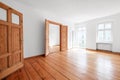 Empty living room in apartment flat with wooden floor and balcony Royalty Free Stock Photo