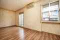 Empty living room with chestnut wood floors and freshly painted Royalty Free Stock Photo