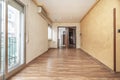 Empty living room with chestnut wood floors and freshly painted Royalty Free Stock Photo