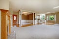 Empty living room with connected kitchen, with hardwood. Royalty Free Stock Photo