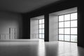 Empty Living room design interior. Modern stylish home area. Concrete floor. Panoramic window. Gray wooden door. No people Royalty Free Stock Photo