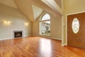 Empty living room with fireplace nd big arch window Royalty Free Stock Photo