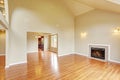 Empty living room with high ceiling and fireplace Royalty Free Stock Photo